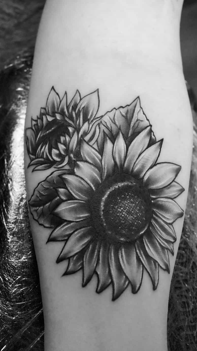 Black and grey realistic sunflower tattoo - Laurel MD