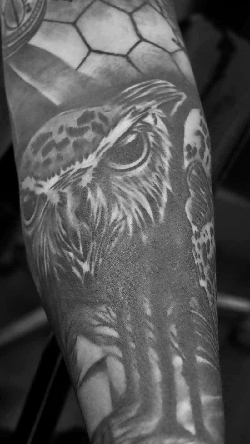 Black and grey realistic owl portrait tattoo - Laurel MD